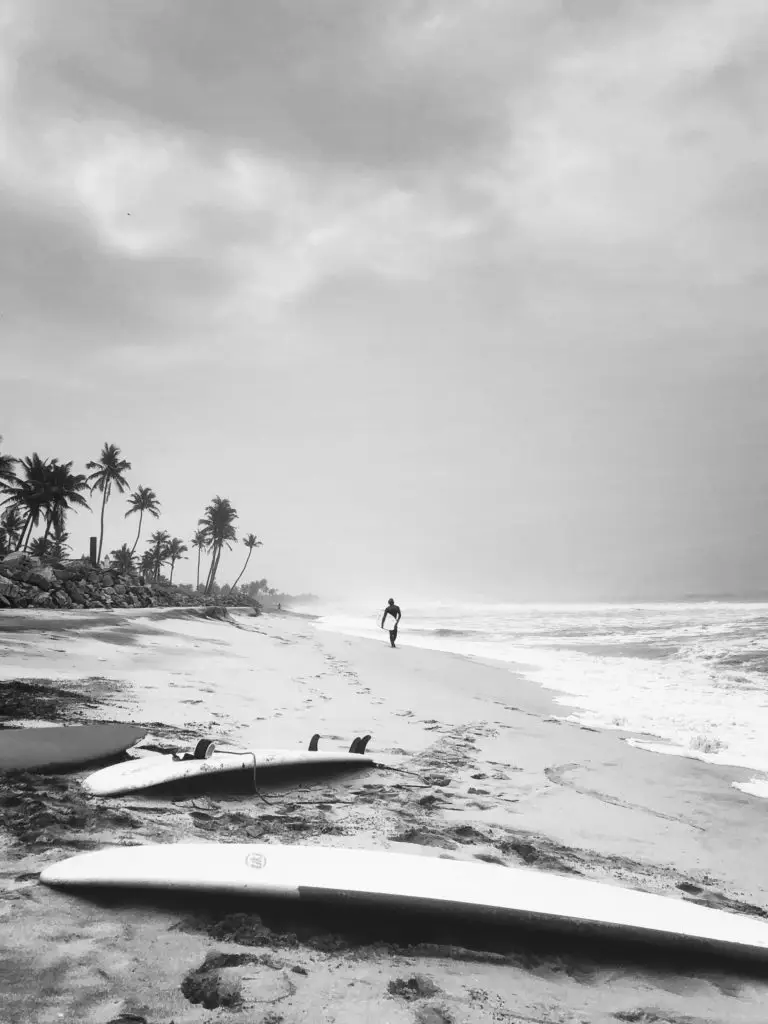 Surfboards lying on a beach