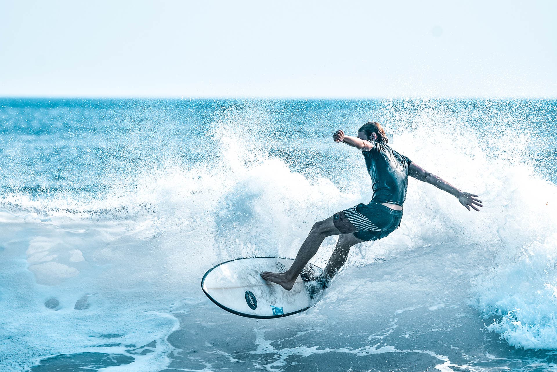 A person on a surfboard