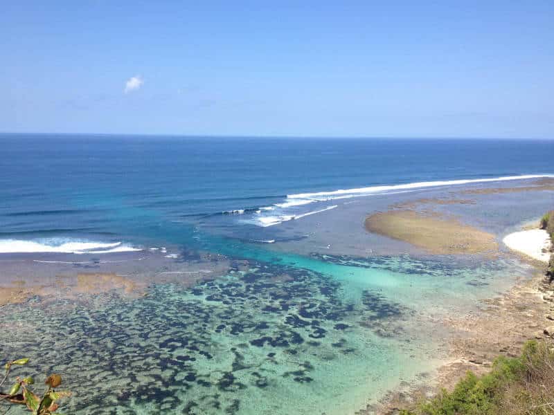 Picture of an ocean taken from a cliff.