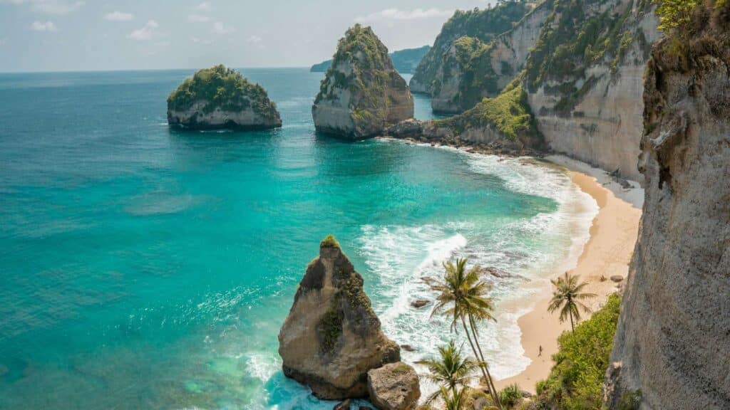 An image of a beach and cliffs in Bali
