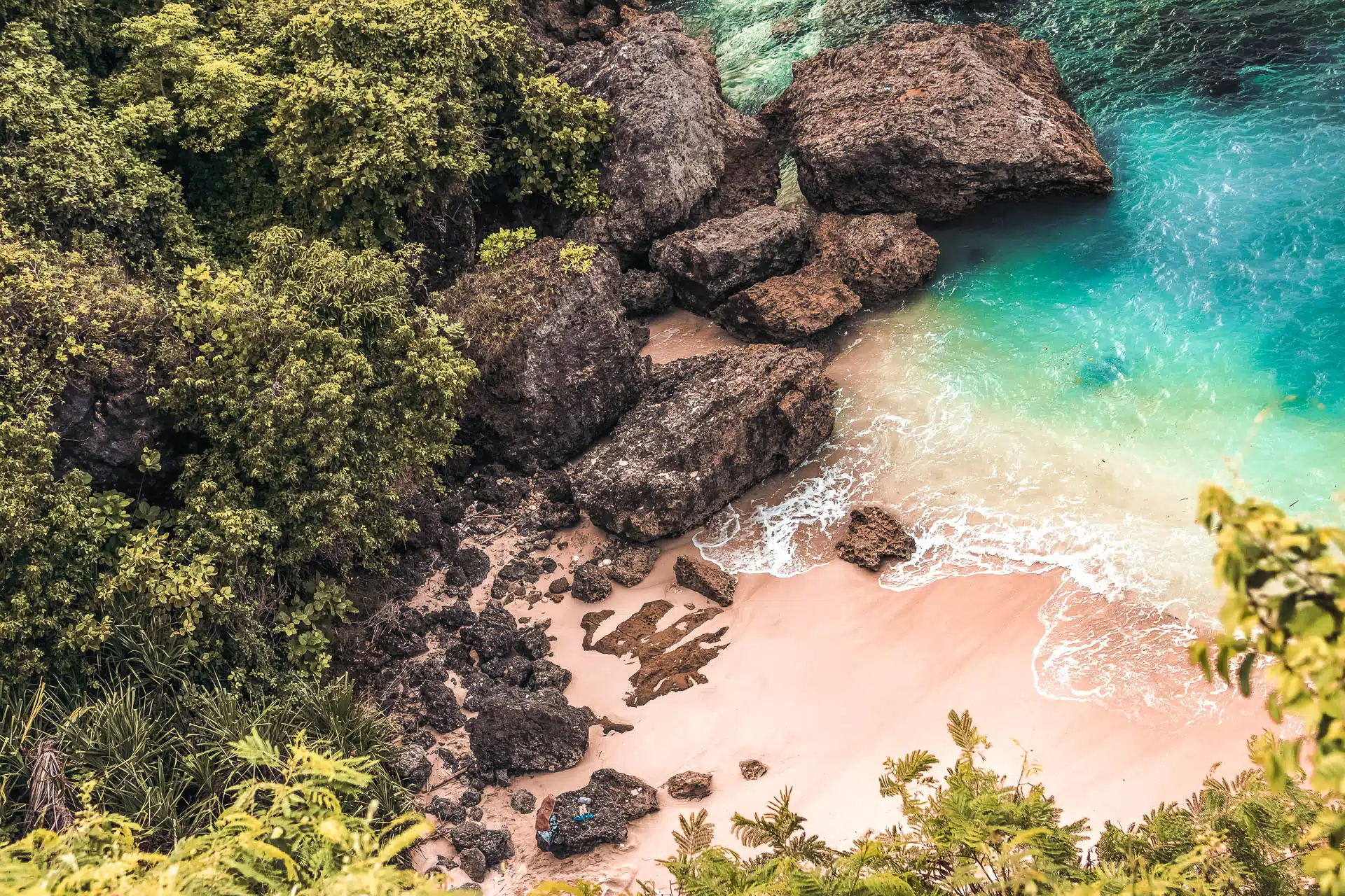 Beach with turquoise water and Large Rocks