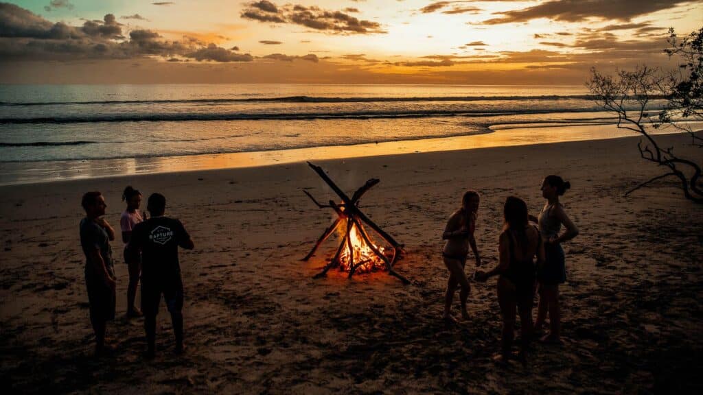 An image of a bonfire on a beach in costa rica