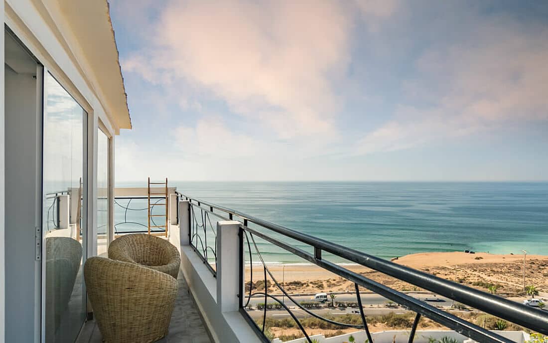 A sitting area in a balcony of a surfcamp in Morocco