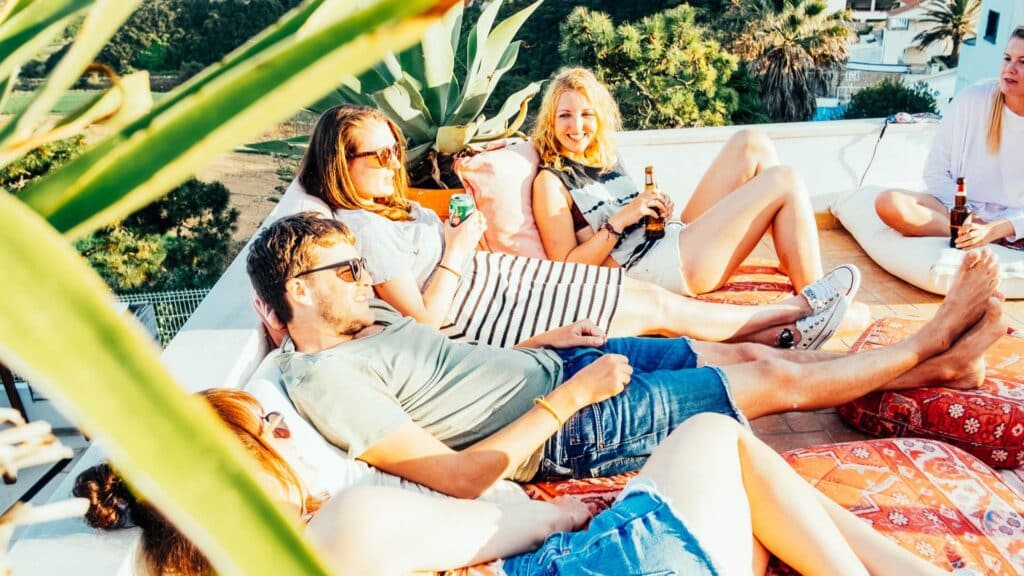 An image of Rapture guests relaxing on the rooftop