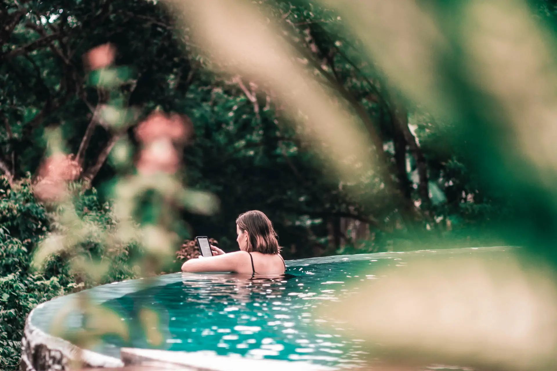 Girl by the pool Surfing in Nicaragua