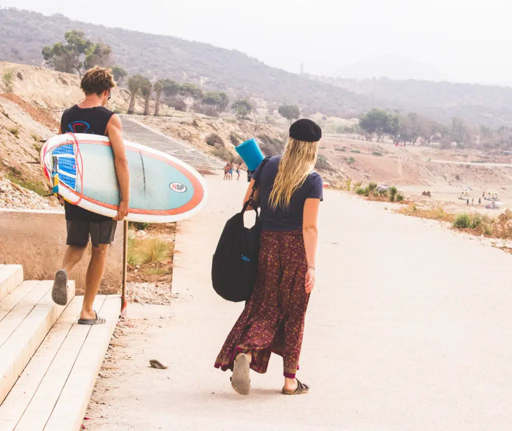 Couple walking to the beach in Morocco