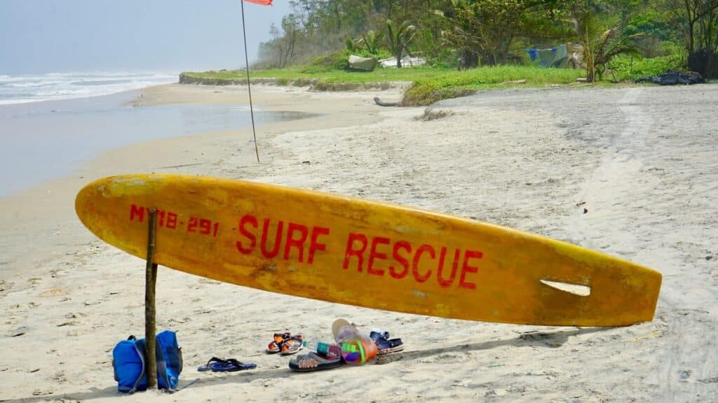 An image of a lifeguard's surfboard at the beach