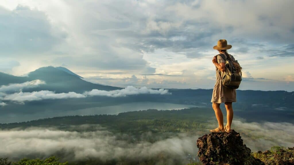 An image of a hiker on top of mt agung