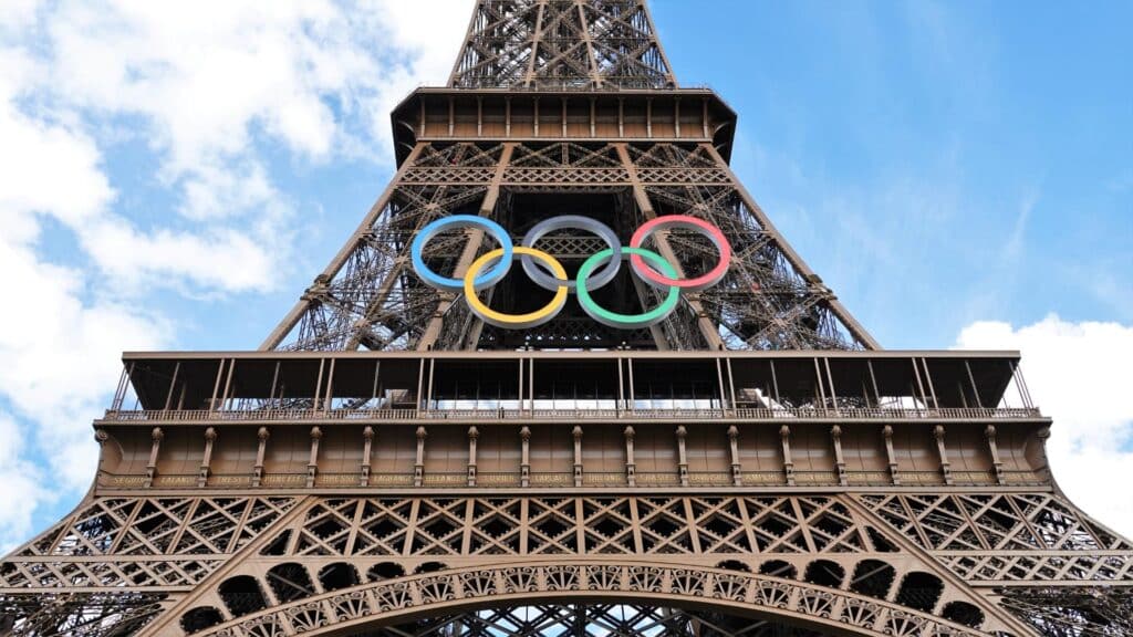 An image of the olympic rings on the Eiffel Tower in Paris