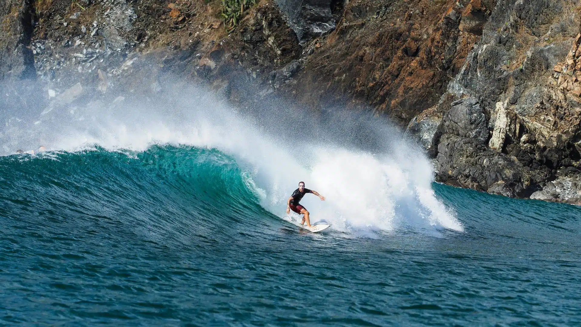 An image of a point break surf