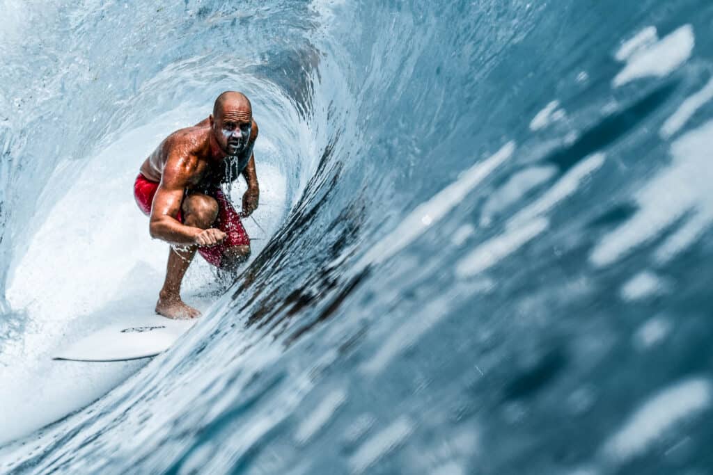 Surfer riding barrels