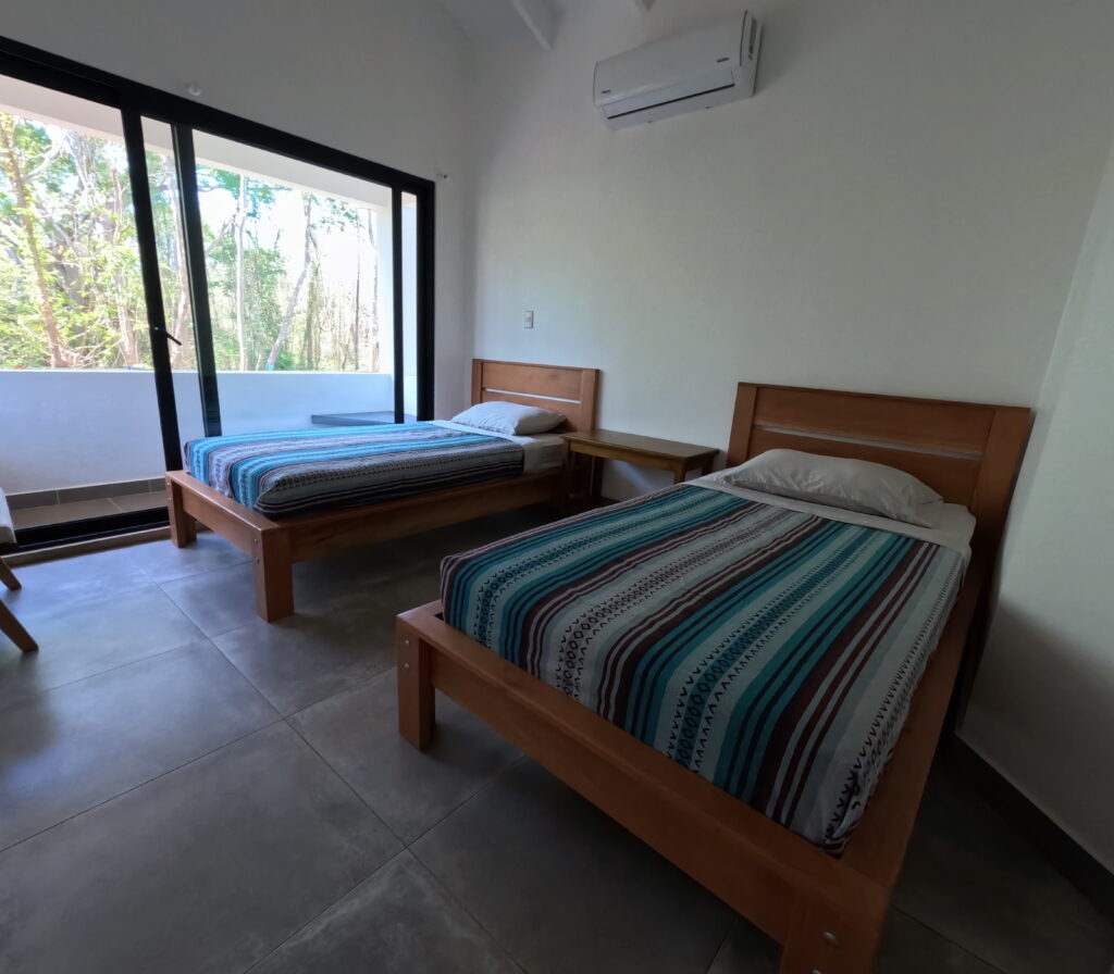 A private room with surf decoration in costa rica