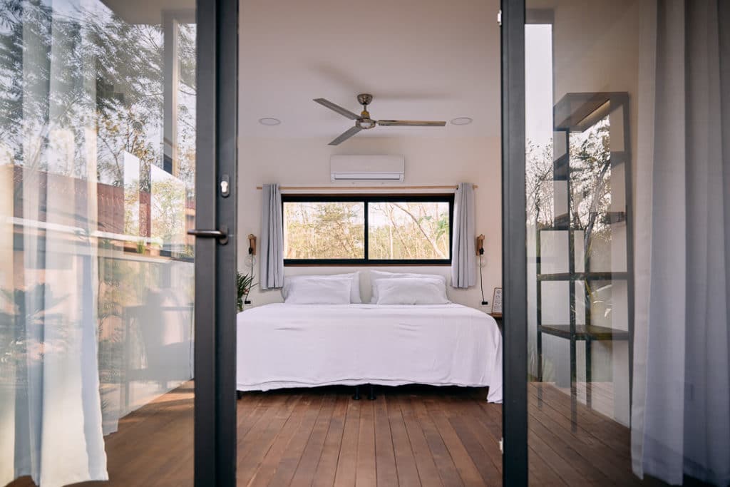 A bed in comfortable room in costa rica