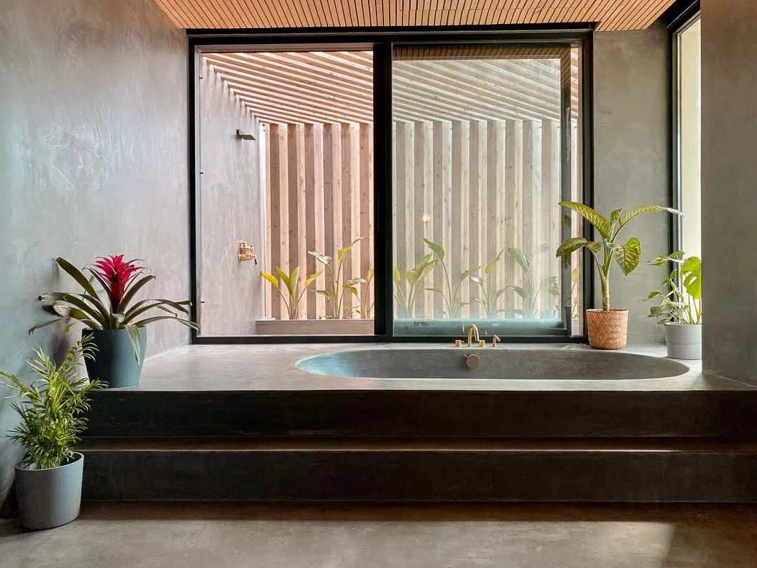 Rapture Surfcamps Ericeira Coxos bathroom in microcement