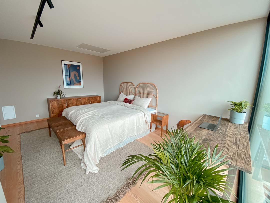 Rapture Surfcamps Ericeira Coxos double room with sea view bed