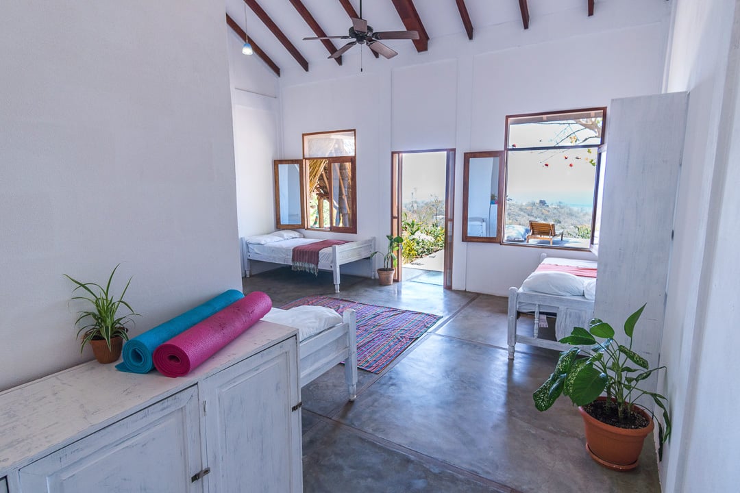 a shared dorm with yoga mats