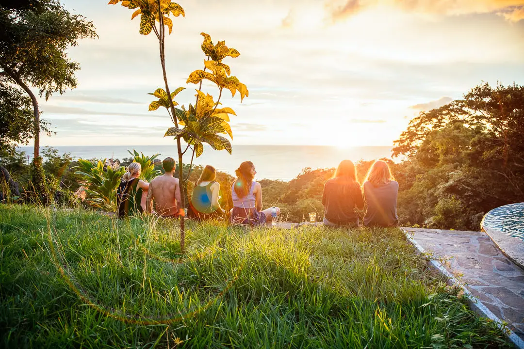 A group of people enjoying the sunset view Nicaragua