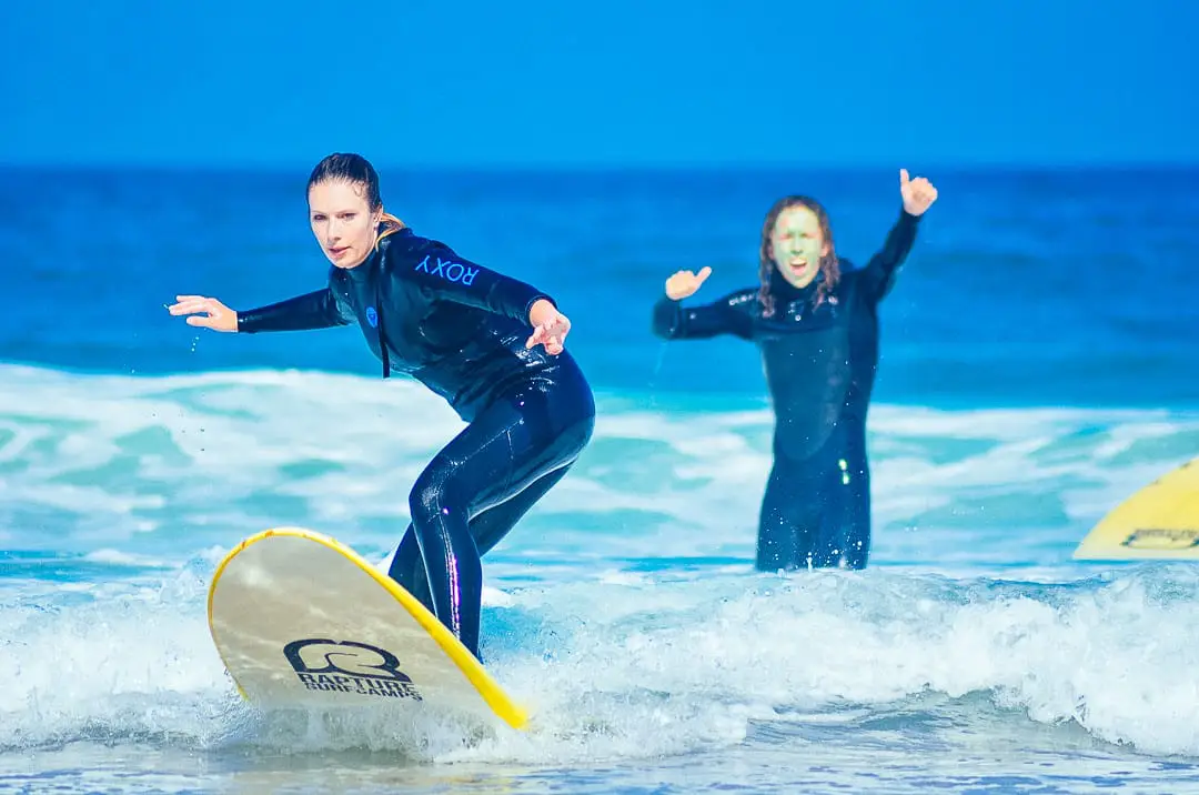 Girl catching her first wave