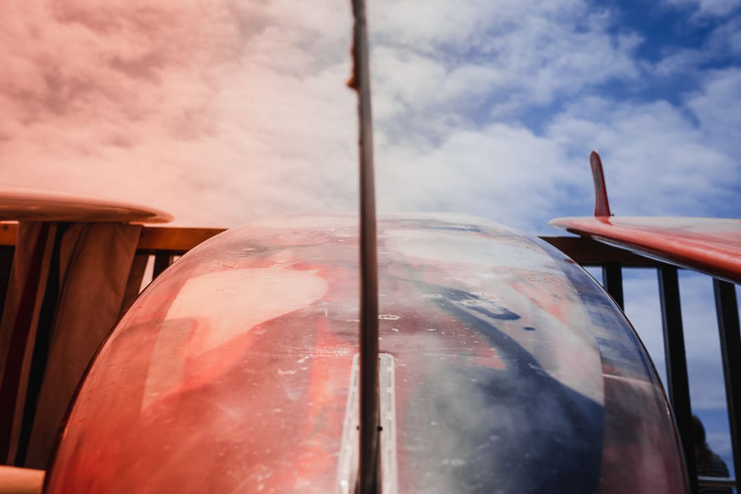 A surfboard in red and blue