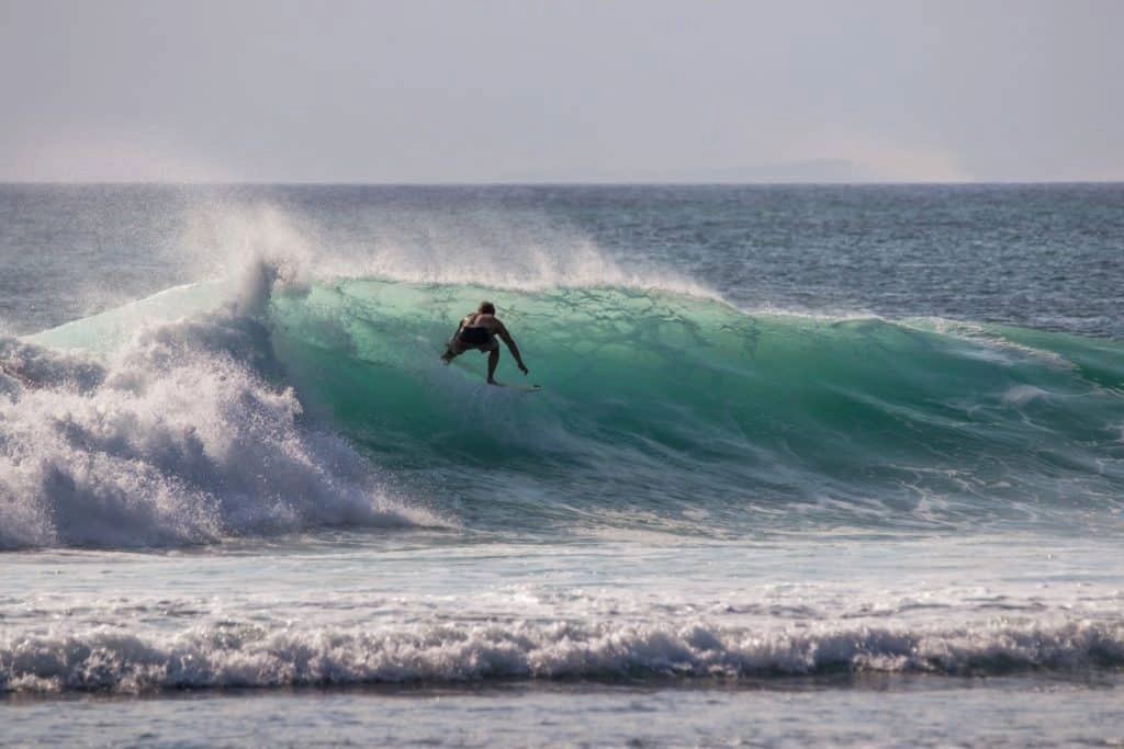 Surfer at Uluwatu