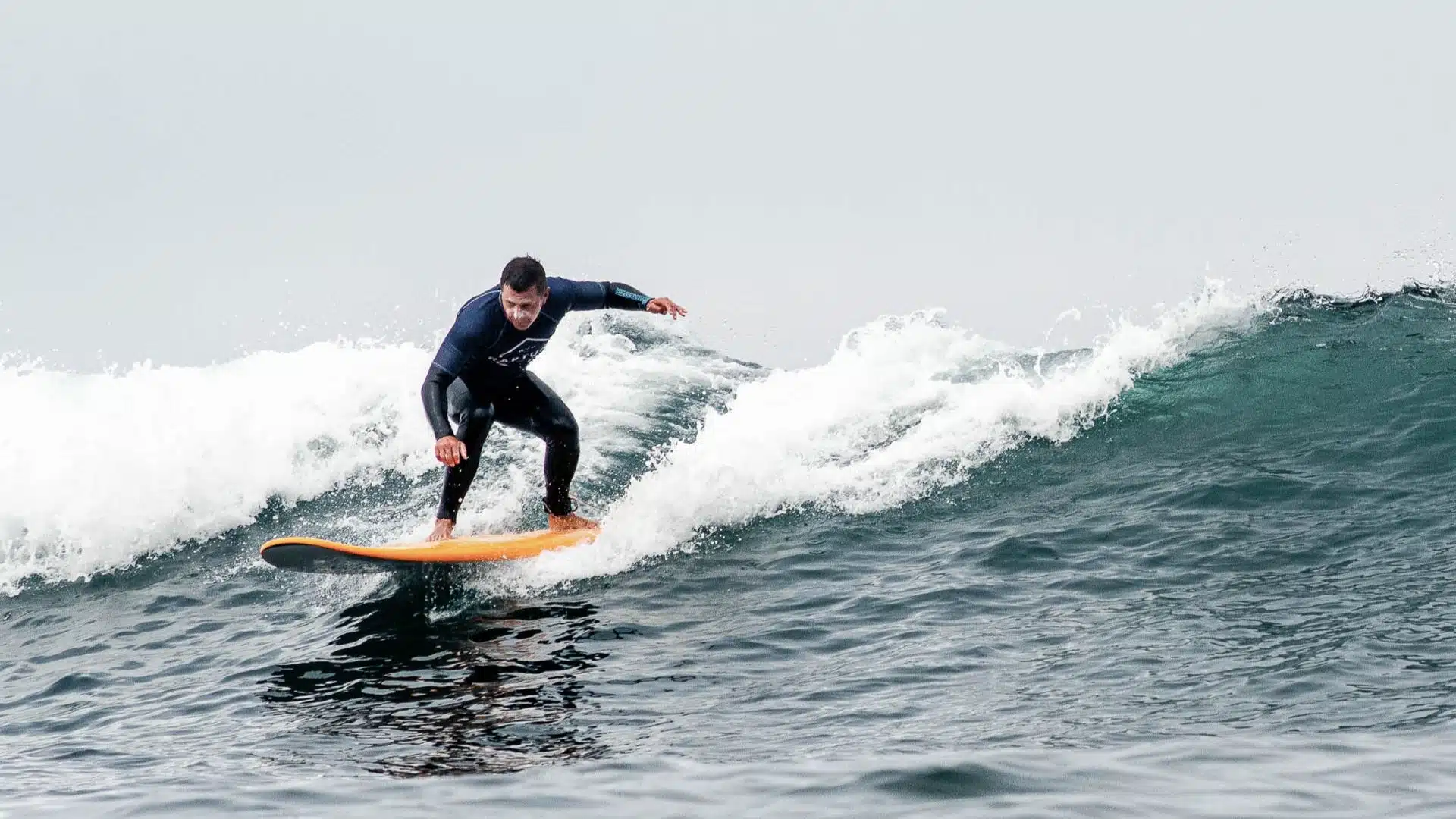 An image of a surfer on a wave
