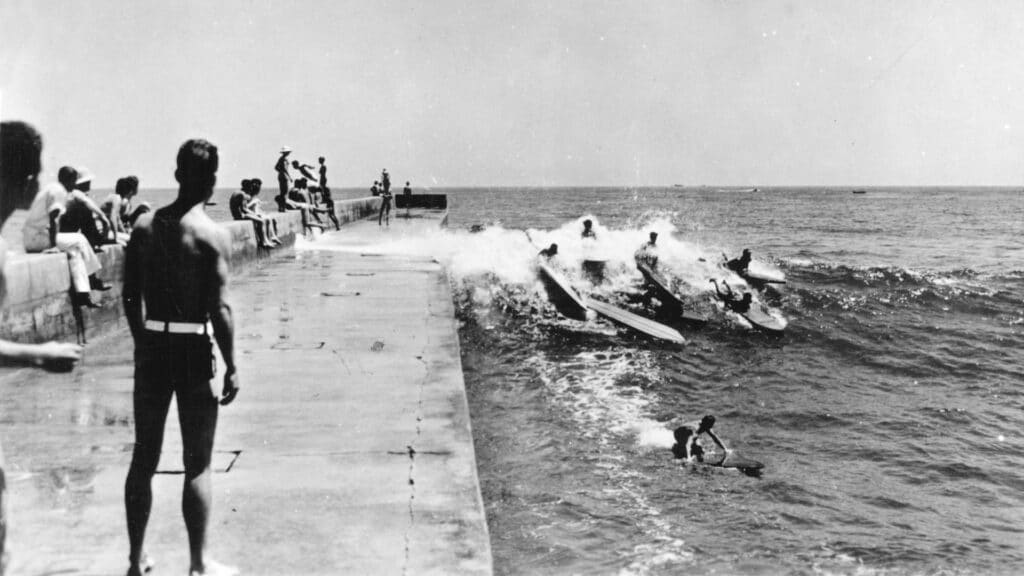 An image of Surfing at Corona Del Mar, circa in the 1950s