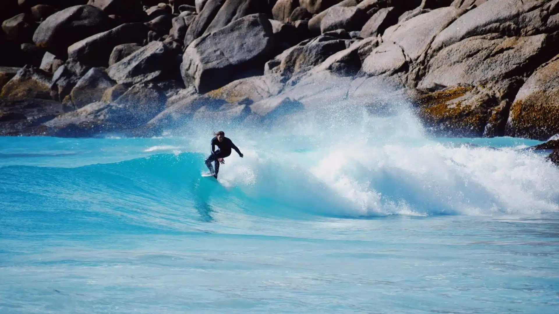 An image of a person surfing a wave
