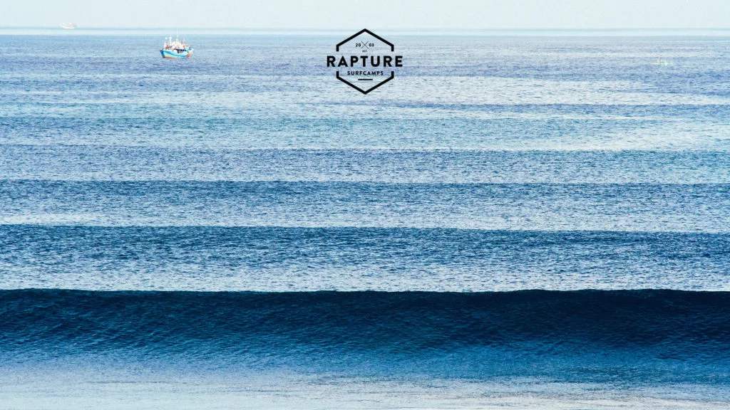 A swell of beautiful blue waves forming